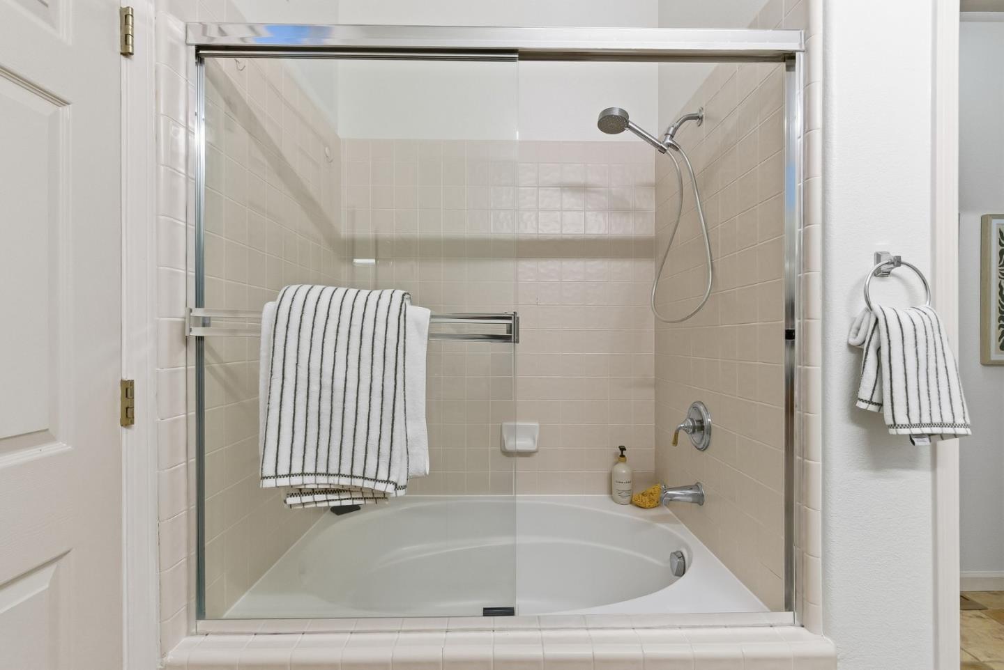 121 Cliff Swallow Court Brisbane, CA 94005 - Photo 28 of 50 a bathroom with a tub and shower