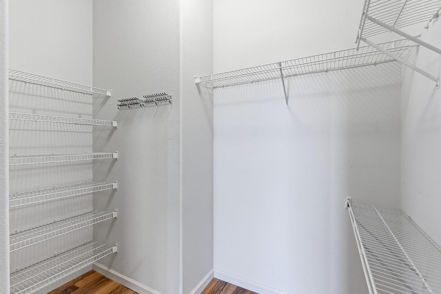 121 Cliff Swallow Court Brisbane, CA 94005 - Photo 29 of 50 a view of a room with racks on the wall