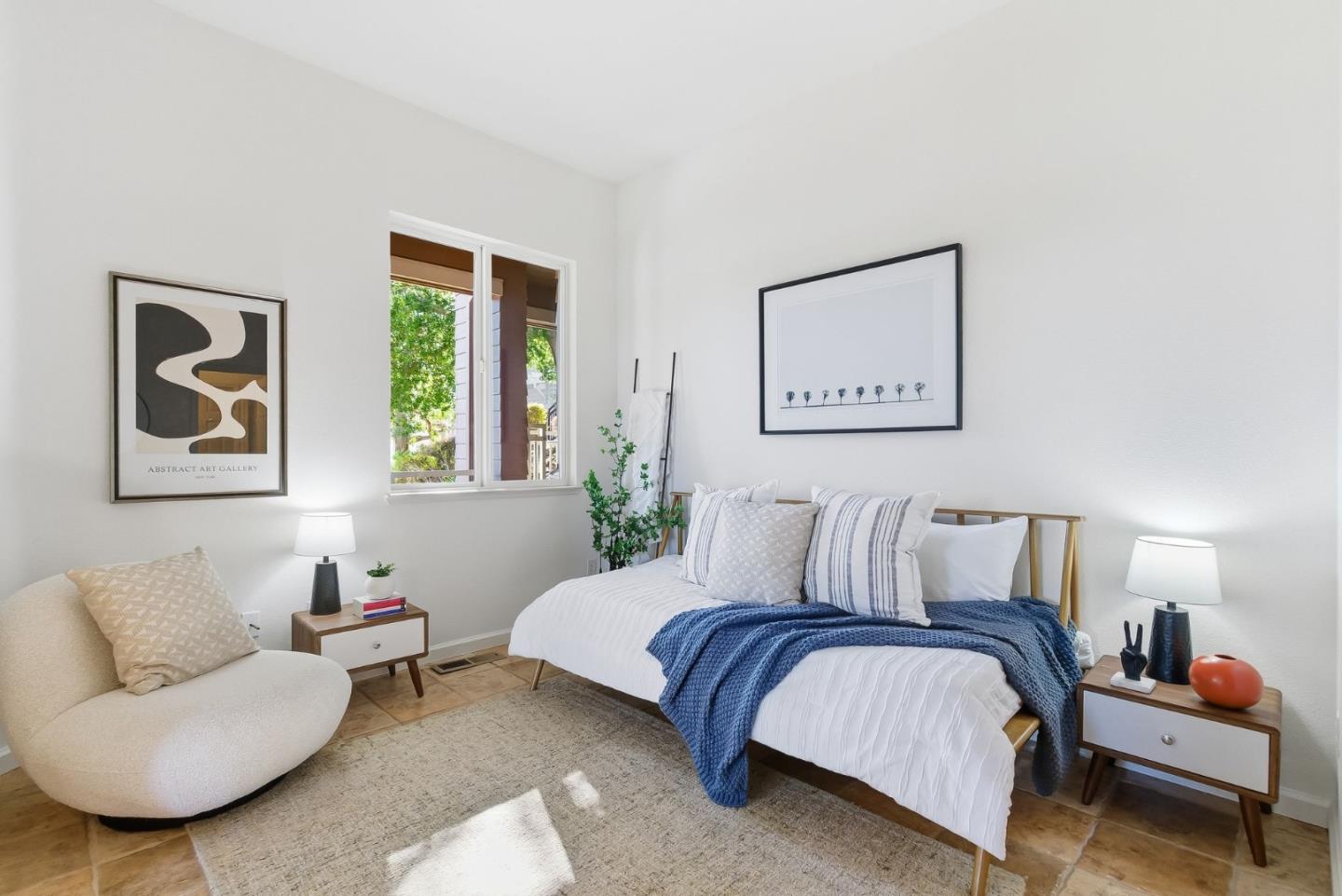 121 Cliff Swallow Court Brisbane, CA 94005 - Photo 30 of 50 a bedroom with a bed and couch