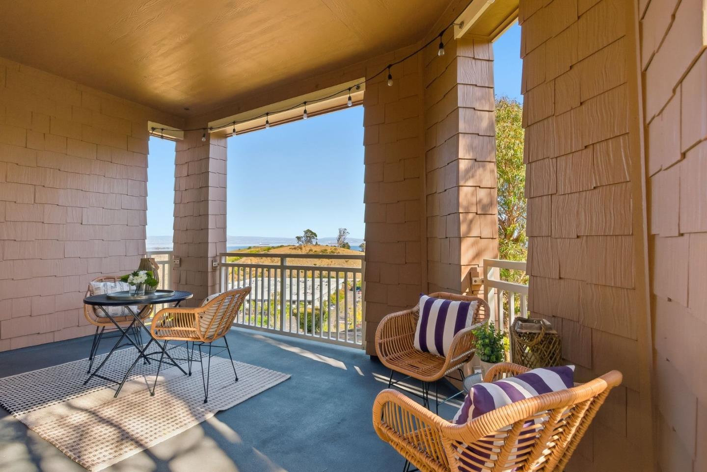 121 Cliff Swallow Court Brisbane, CA 94005 - Photo 38 of 50 a balcony with with furniture and rug