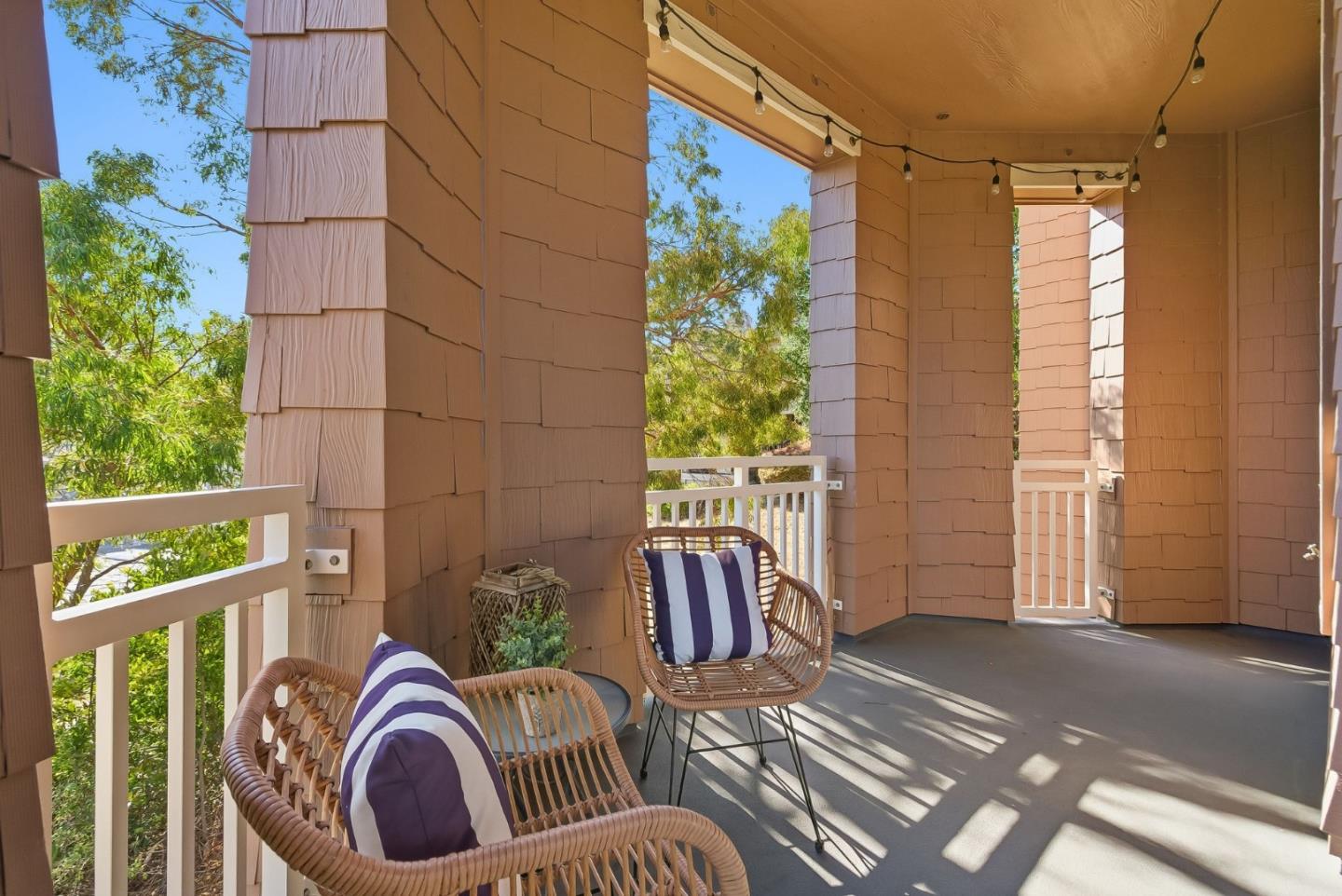 121 Cliff Swallow Court Brisbane, CA 94005 - Photo 40 of 50 a view of a balcony with furniture and floor to ceiling window