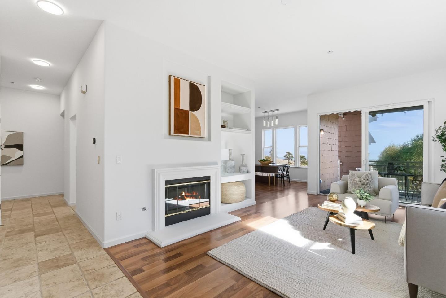121 Cliff Swallow Court Brisbane, CA 94005 - Photo 4 of 50 a living room with furniture and a fireplace