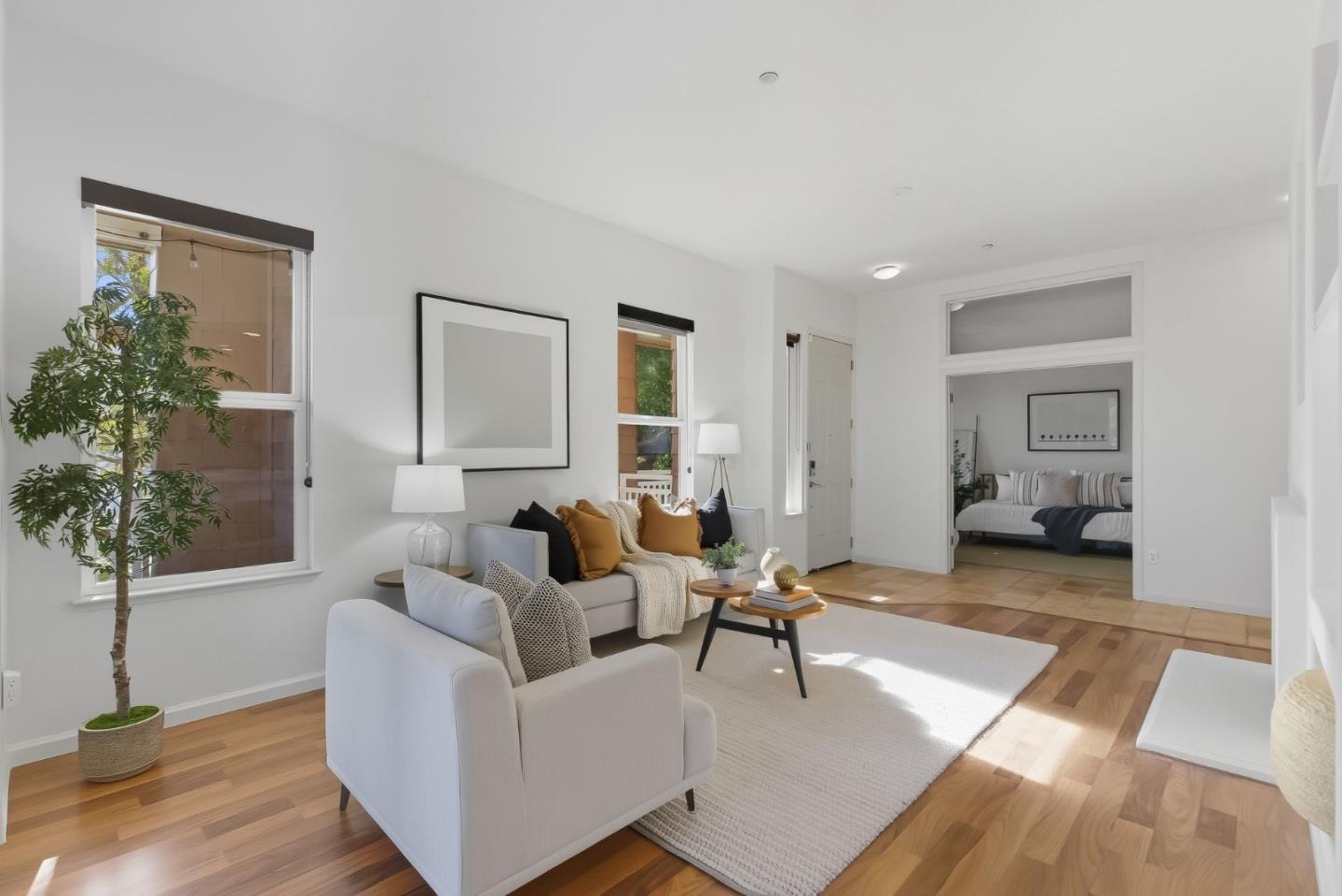 121 Cliff Swallow Court Brisbane, CA 94005 - Photo 6 of 50 a living room with furniture and a potted plant