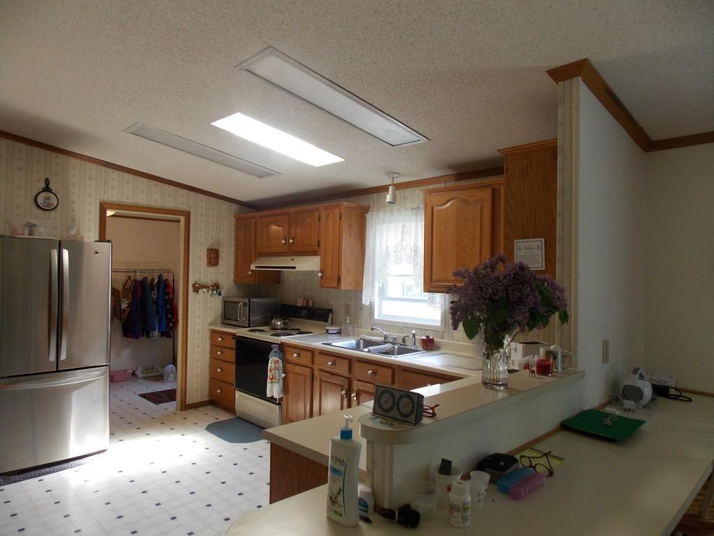 179 Industry Road New Sharon, ME 04955 - Photo 11 of 26 Large, beautiful kitchen, mudroom to...