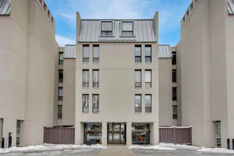 a view of a building with a street