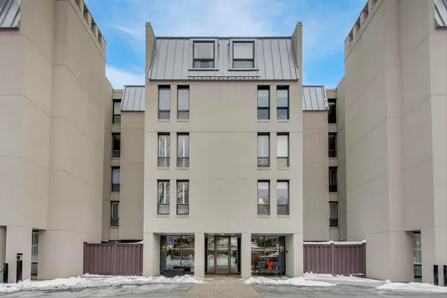 a view of a building with a street