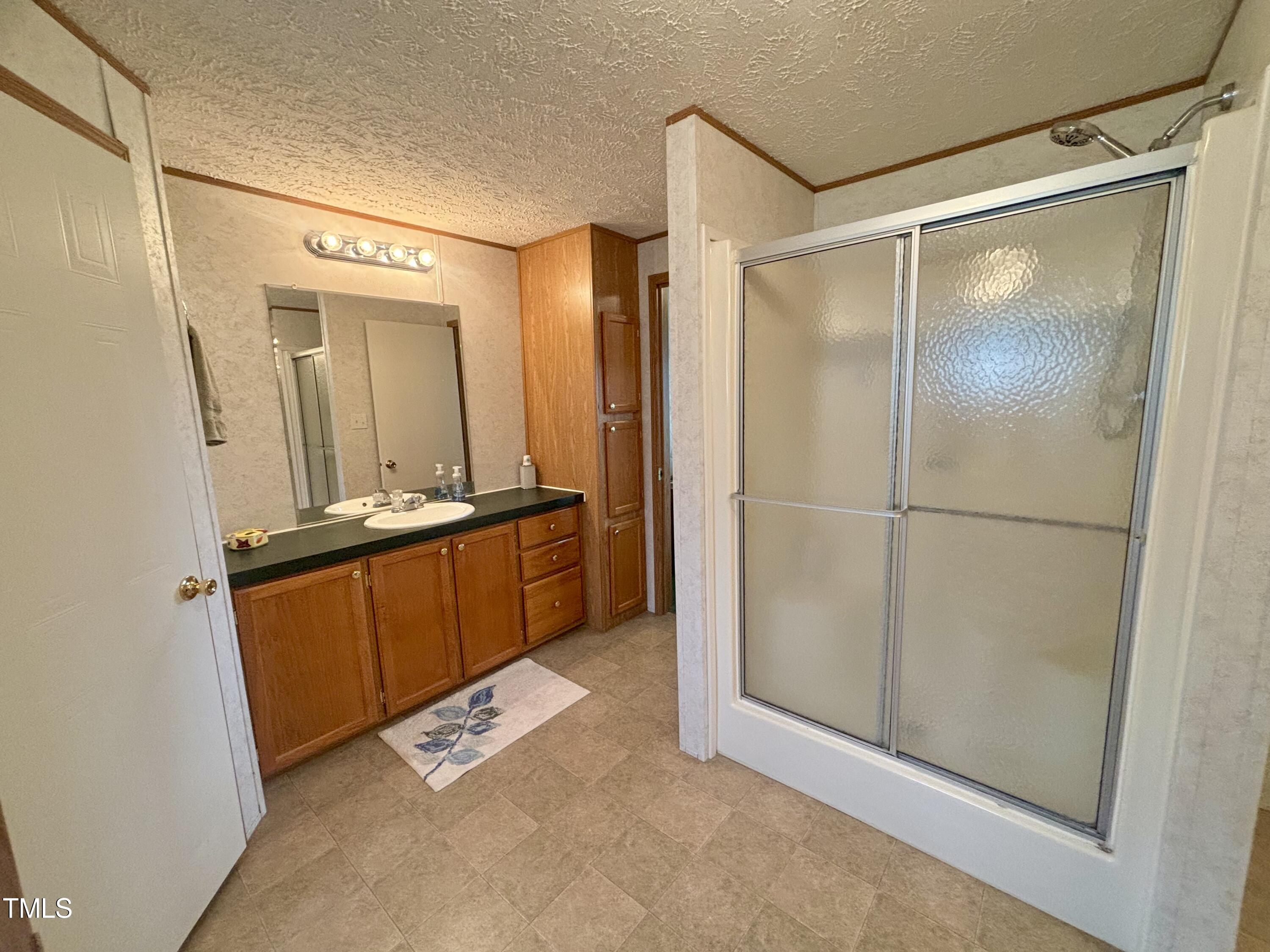 1492 Evans Road Princeton, NC 27569 - Photo 18 of 26 Primary bathroom - shower