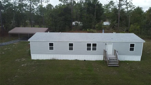 a house view with a garden space