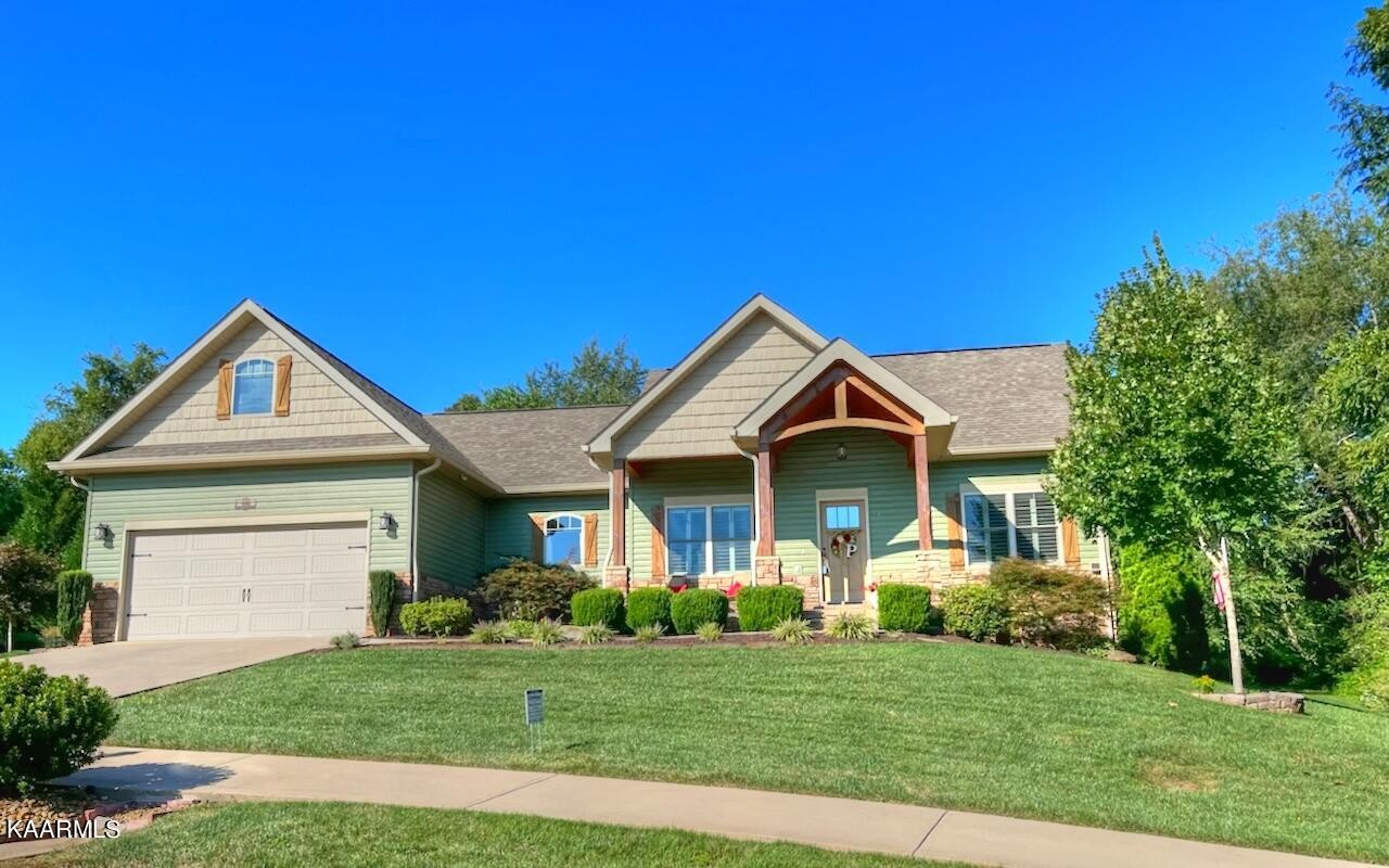 418 Cheeyo Place Loudon, TN 37774 - Photo 1 of 33 a front view of a house with a yard