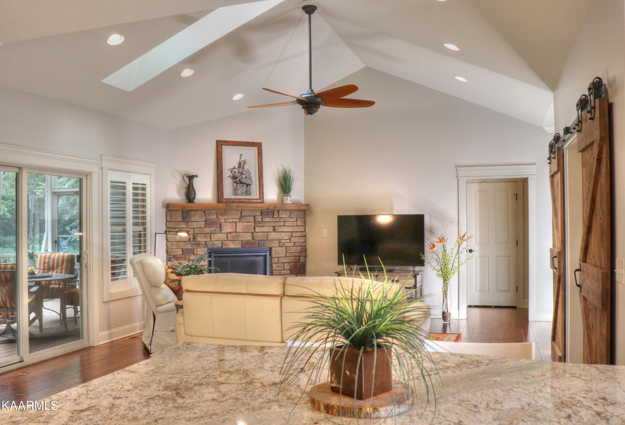 418 Cheeyo Place Loudon, TN 37774 - Photo 15 of 33 a living room with fireplace furniture and a flat screen tv
