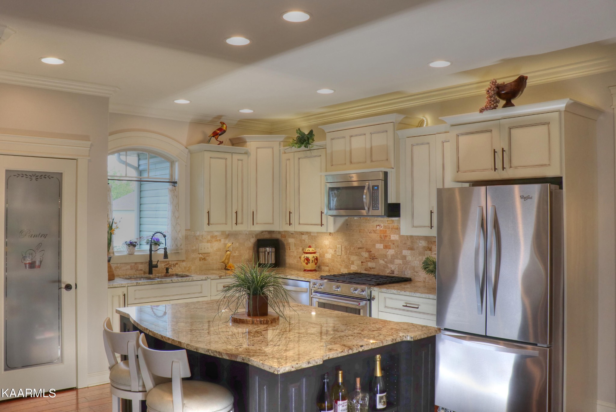 418 Cheeyo Place Loudon, TN 37774 - Photo 17 of 33 a kitchen with stainless steel appliances granite countertop a refrigerator a sink and a stove