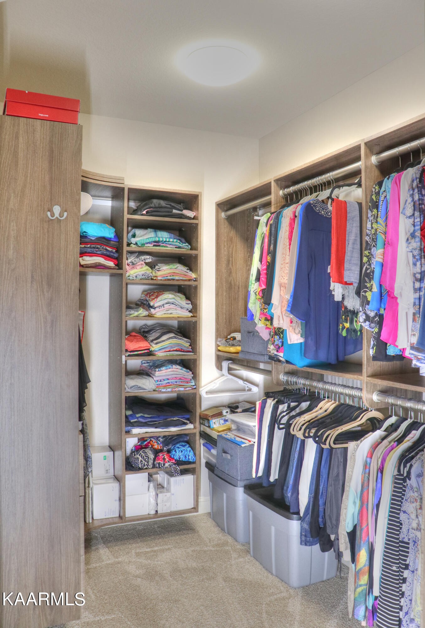 418 Cheeyo Place Loudon, TN 37774 - Photo 23 of 33 a view of walk in closet with clothes and shoes