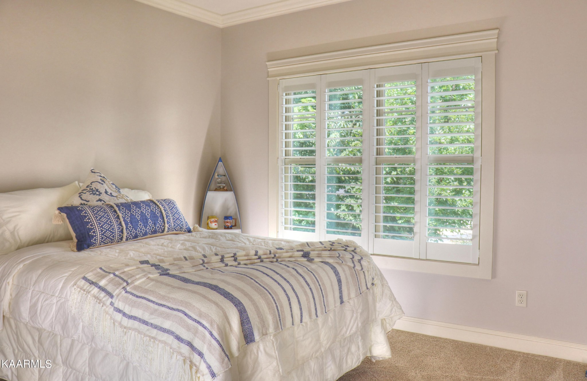 418 Cheeyo Place Loudon, TN 37774 - Photo 27 of 33 a bed sitting in a bedroom next to a window