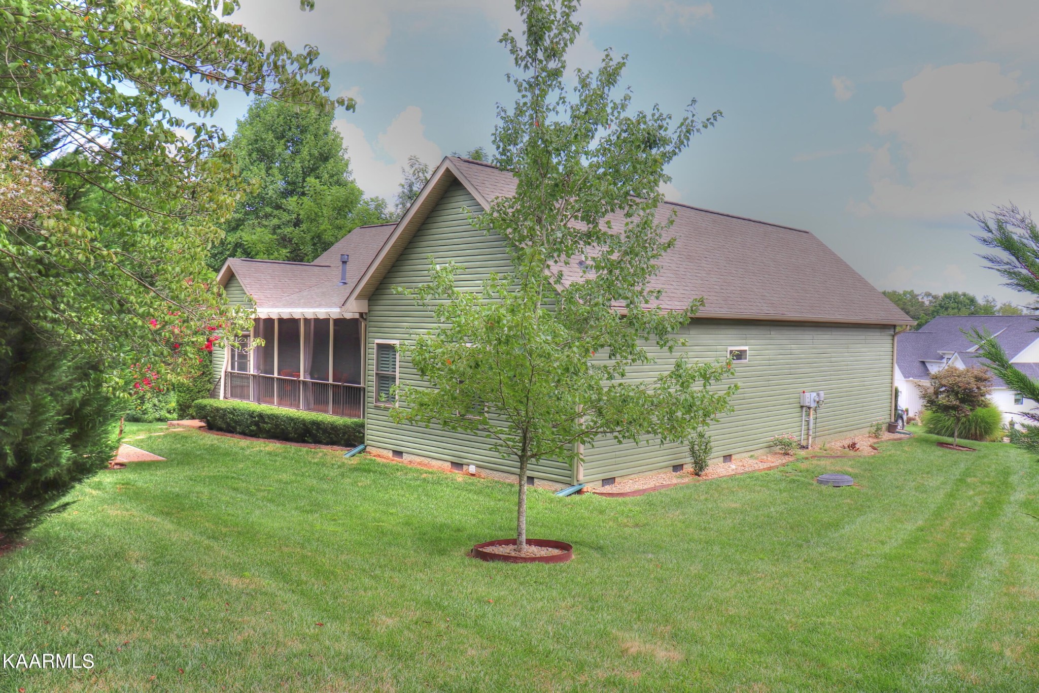 418 Cheeyo Place Loudon, TN 37774 - Photo 6 of 33 a front view of a house with a yard