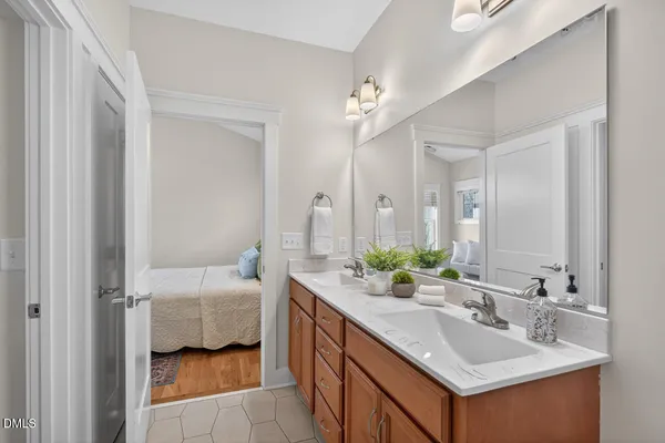 a bathroom with a glass shower door