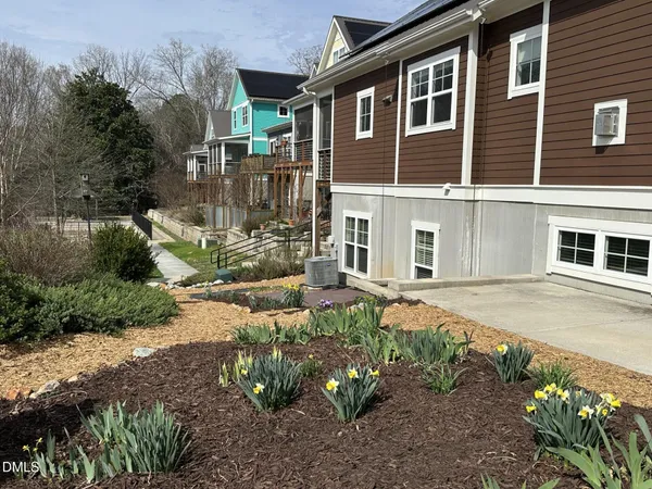 a view of a livingroom with furniture and a ceiling fan