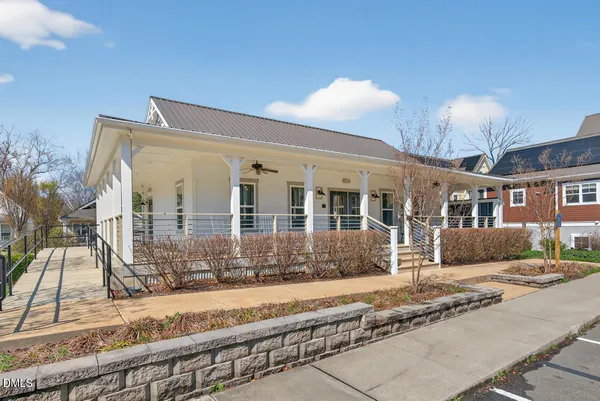 a living room with furniture workspace and a window
