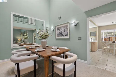 a view of a dining room and livingroom