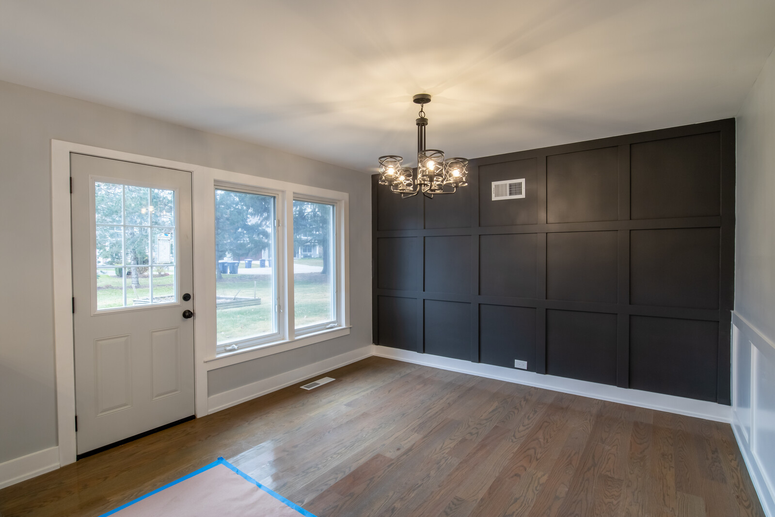 1241 Deerfield Road Deerfield, IL 60015 - Photo 11 of 37 a view of an empty room with wooden floor and a window