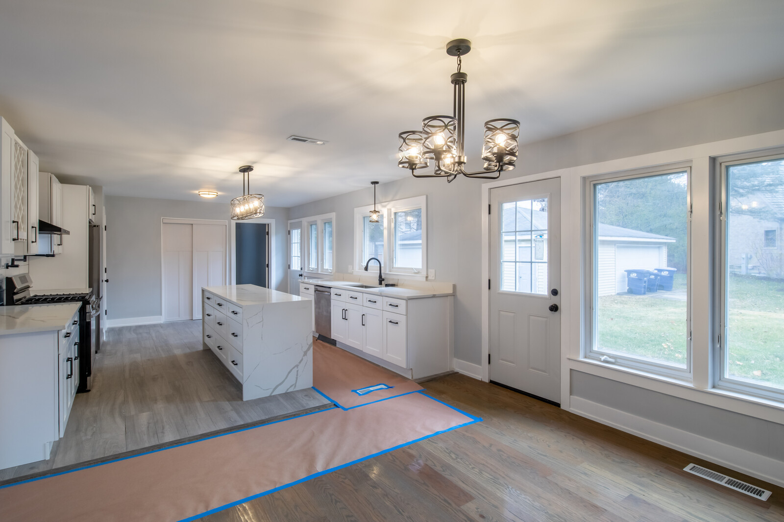 1241 Deerfield Road Deerfield, IL 60015 - Photo 12 of 37 a view of a living room and kitchen with granite countertop lots of counter top space