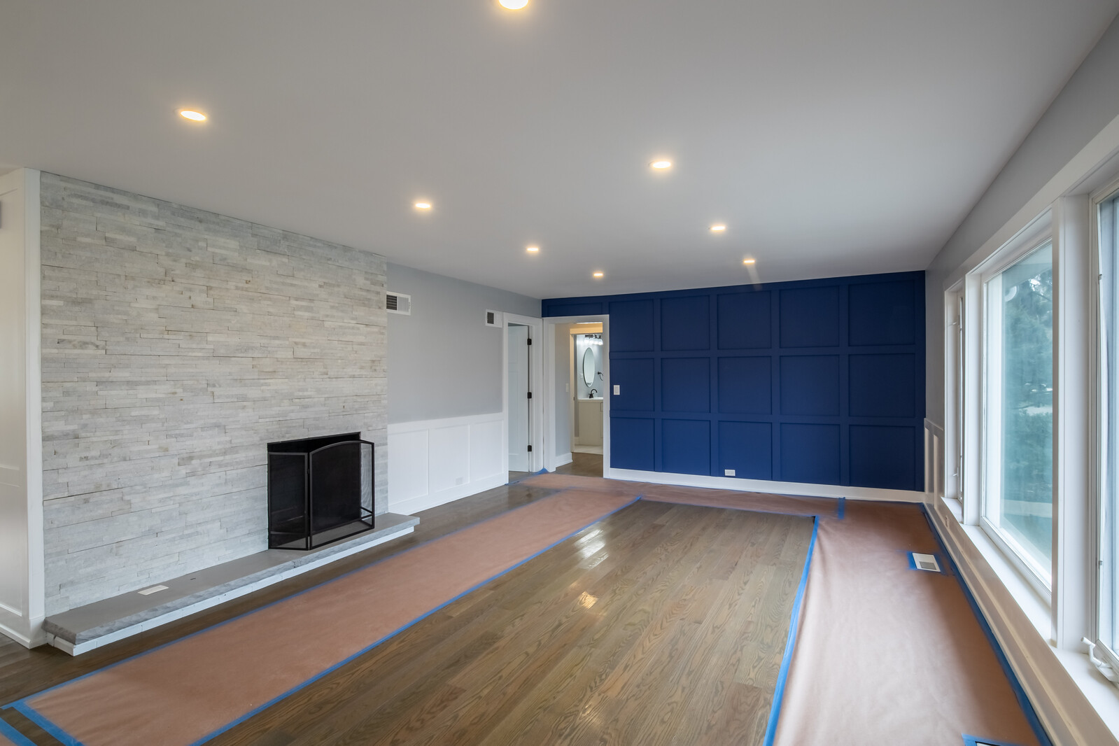 1241 Deerfield Road Deerfield, IL 60015 - Photo 3 of 37 wooden floor in an empty room with a fireplace
