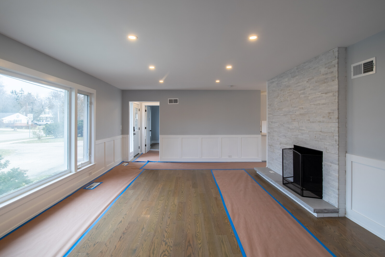 1241 Deerfield Road Deerfield, IL 60015 - Photo 5 of 37 a view of an empty room with a fireplace and a window