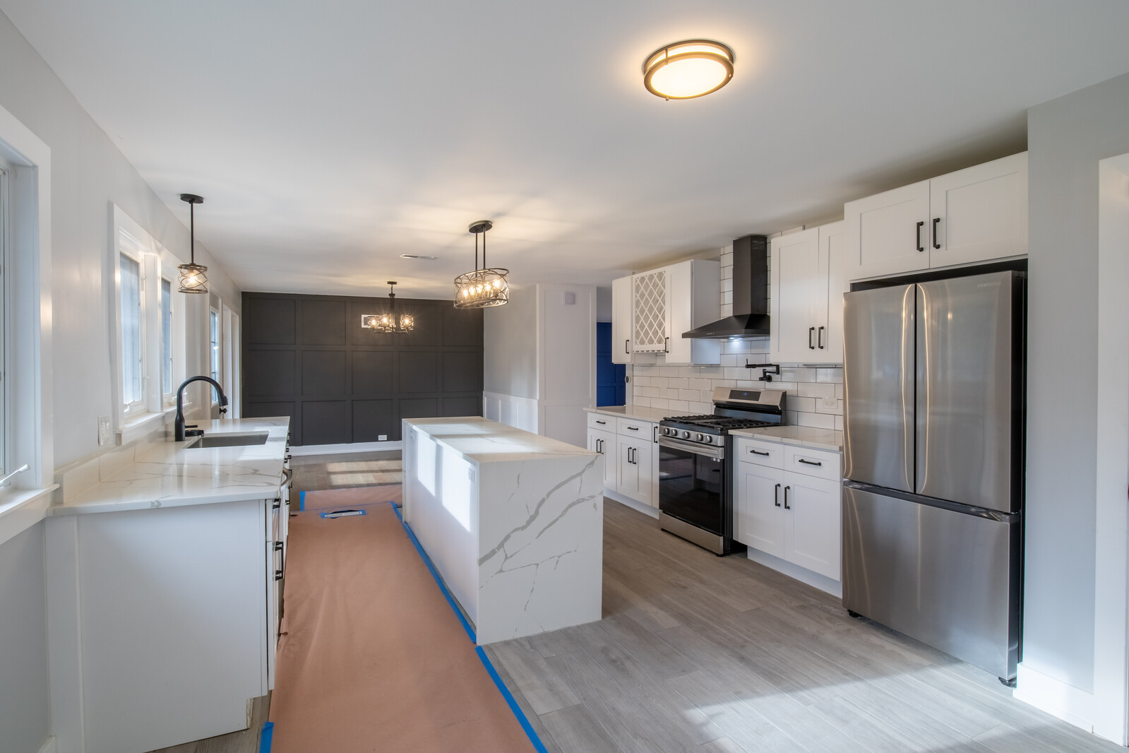 1241 Deerfield Road Deerfield, IL 60015 - Photo 6 of 37 a kitchen with stainless steel appliances a refrigerator sink and stove
