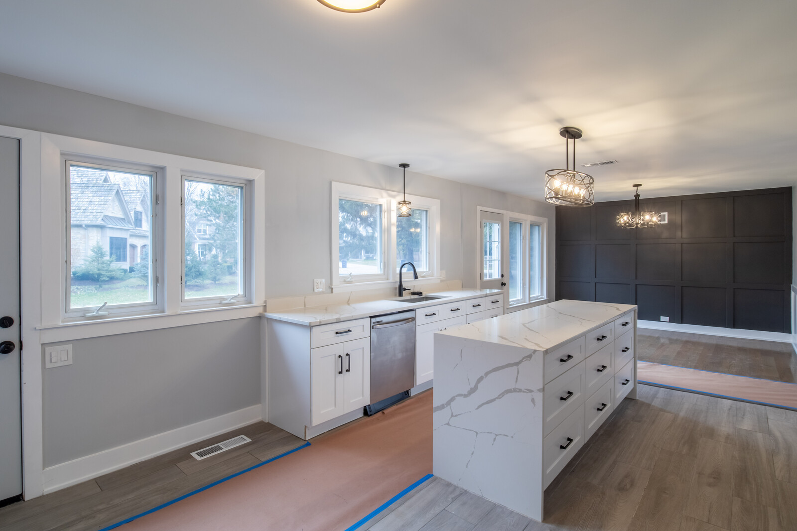 1241 Deerfield Road Deerfield, IL 60015 - Photo 8 of 37 a large bathroom with a double vanity sink a large mirror and a bathtub