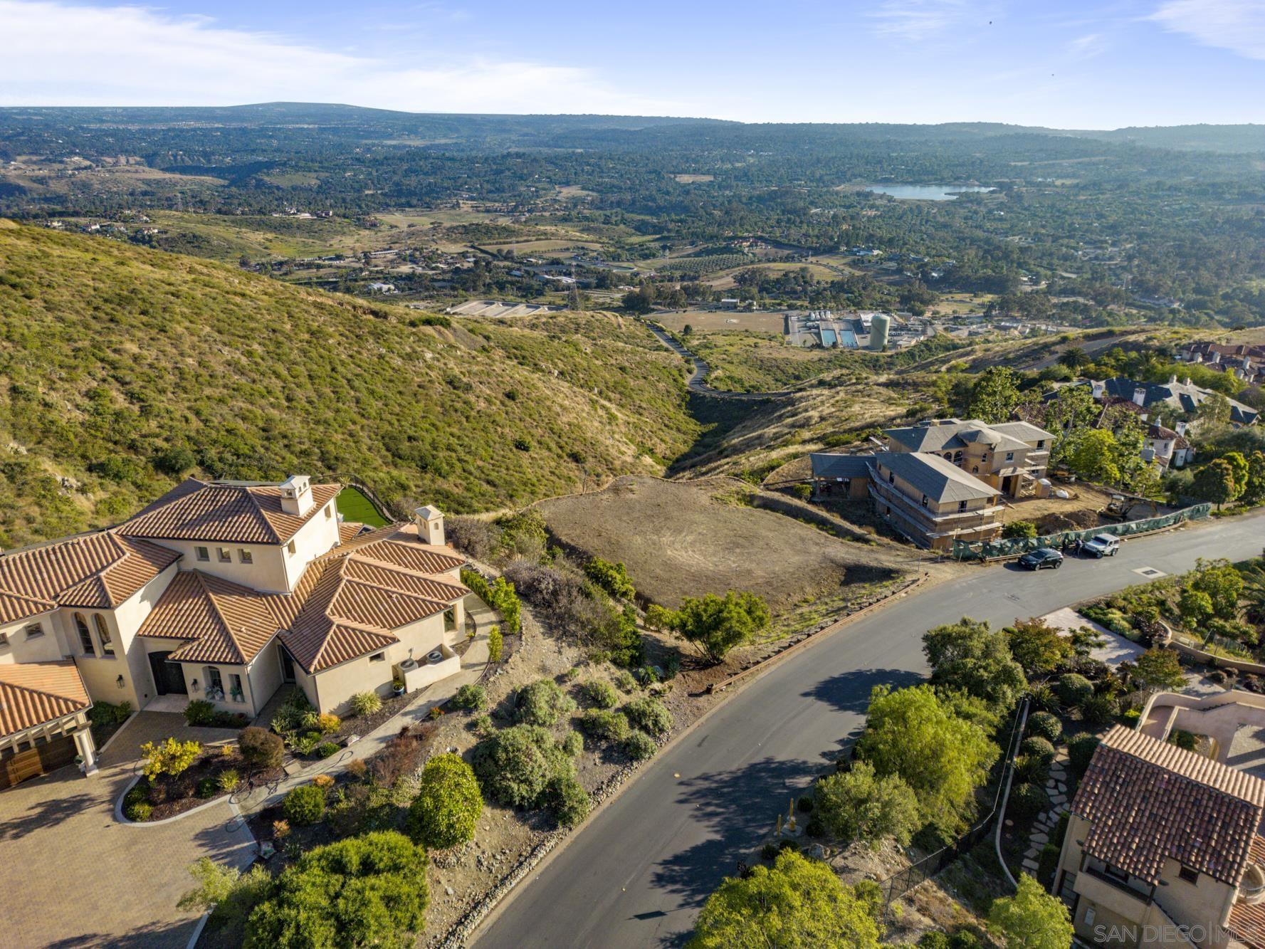 0 Camino De Arriba, Unit 148 Rancho Santa Fe, CA 92067 - Photo 9 of 17 an aerial view of residential houses with outdoor space
