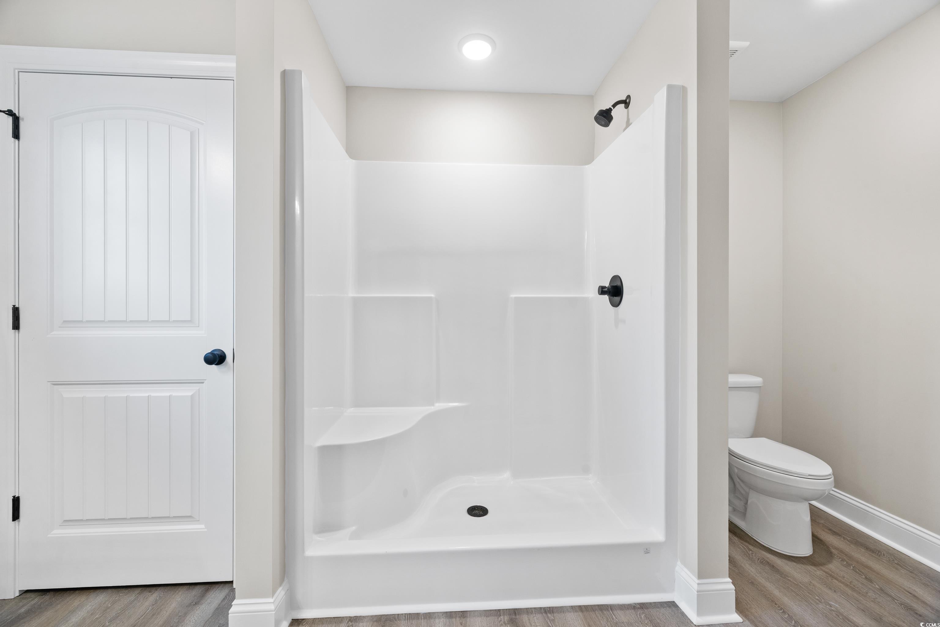 3646 Bethel Chapel Road Loris, SC 29569 - Photo 29 of 40 Full bath featuring wood finished floors and a stall shower