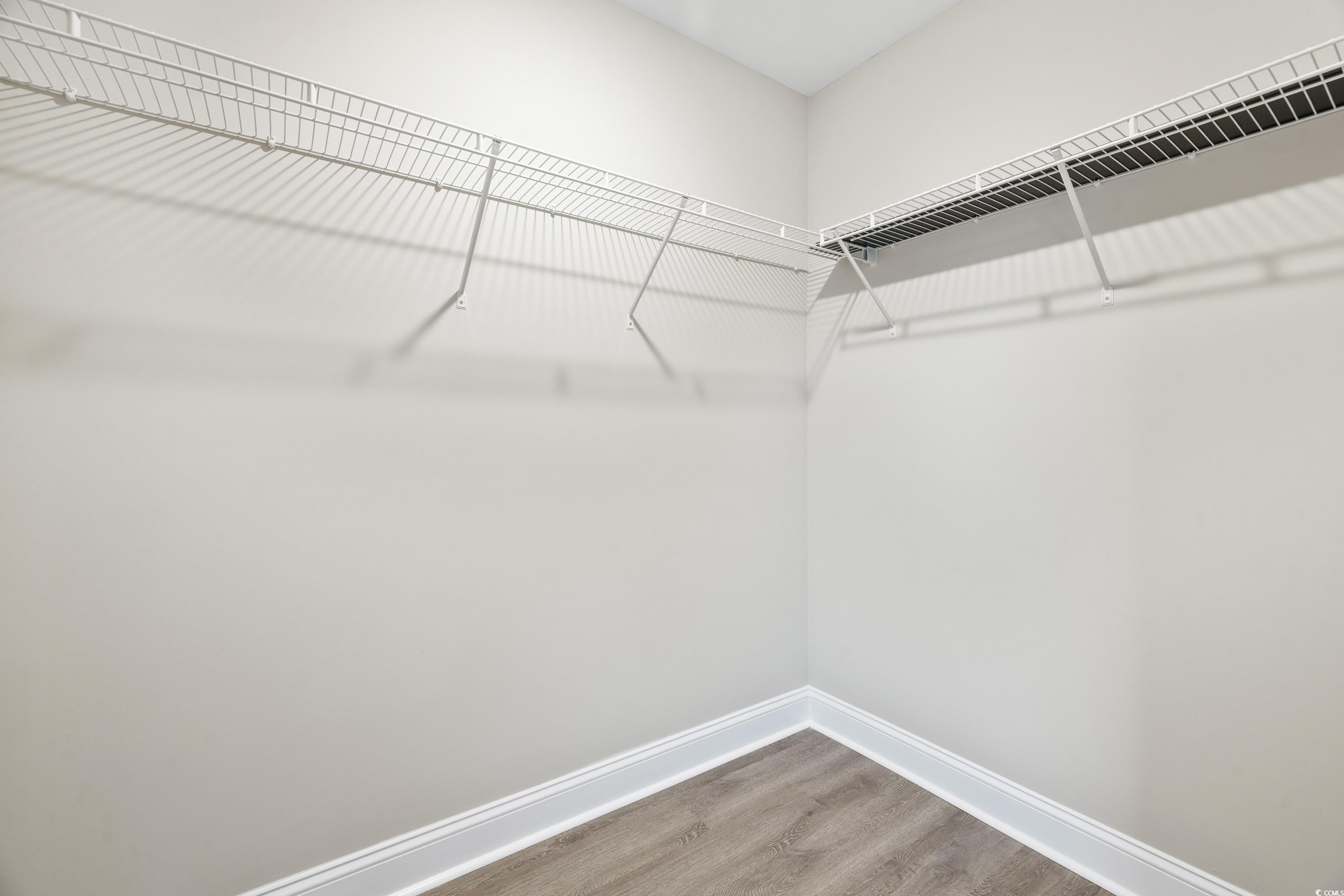 3646 Bethel Chapel Road Loris, SC 29569 - Photo 37 of 40 Spacious closet with light wood-type flooring