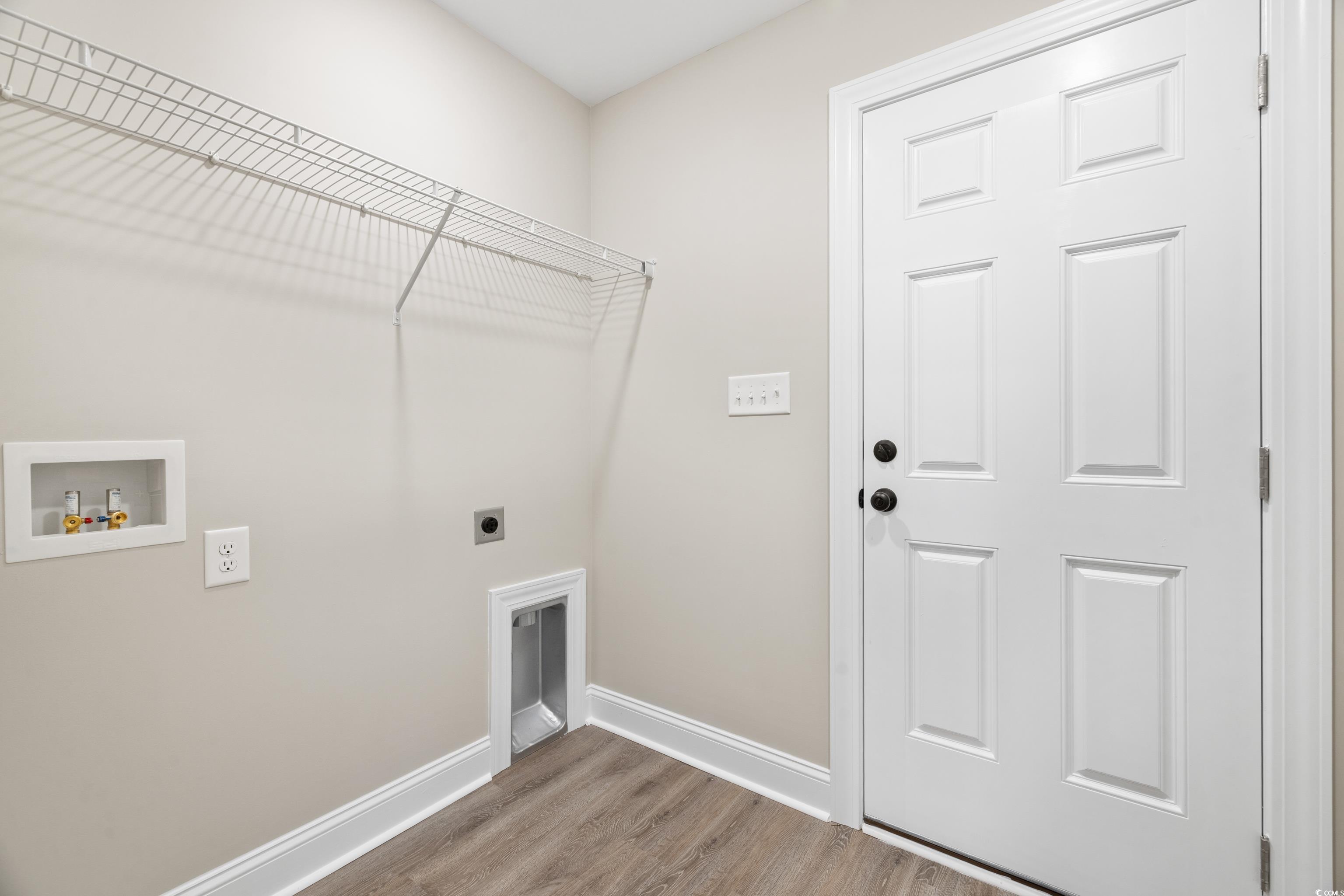 3646 Bethel Chapel Road Loris, SC 29569 - Photo 38 of 40 Laundry room with wood finished floors, hookup for a washing machine, and electric dryer hookup