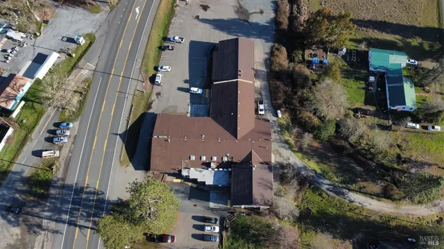 an aerial view of houses with outdoor space
