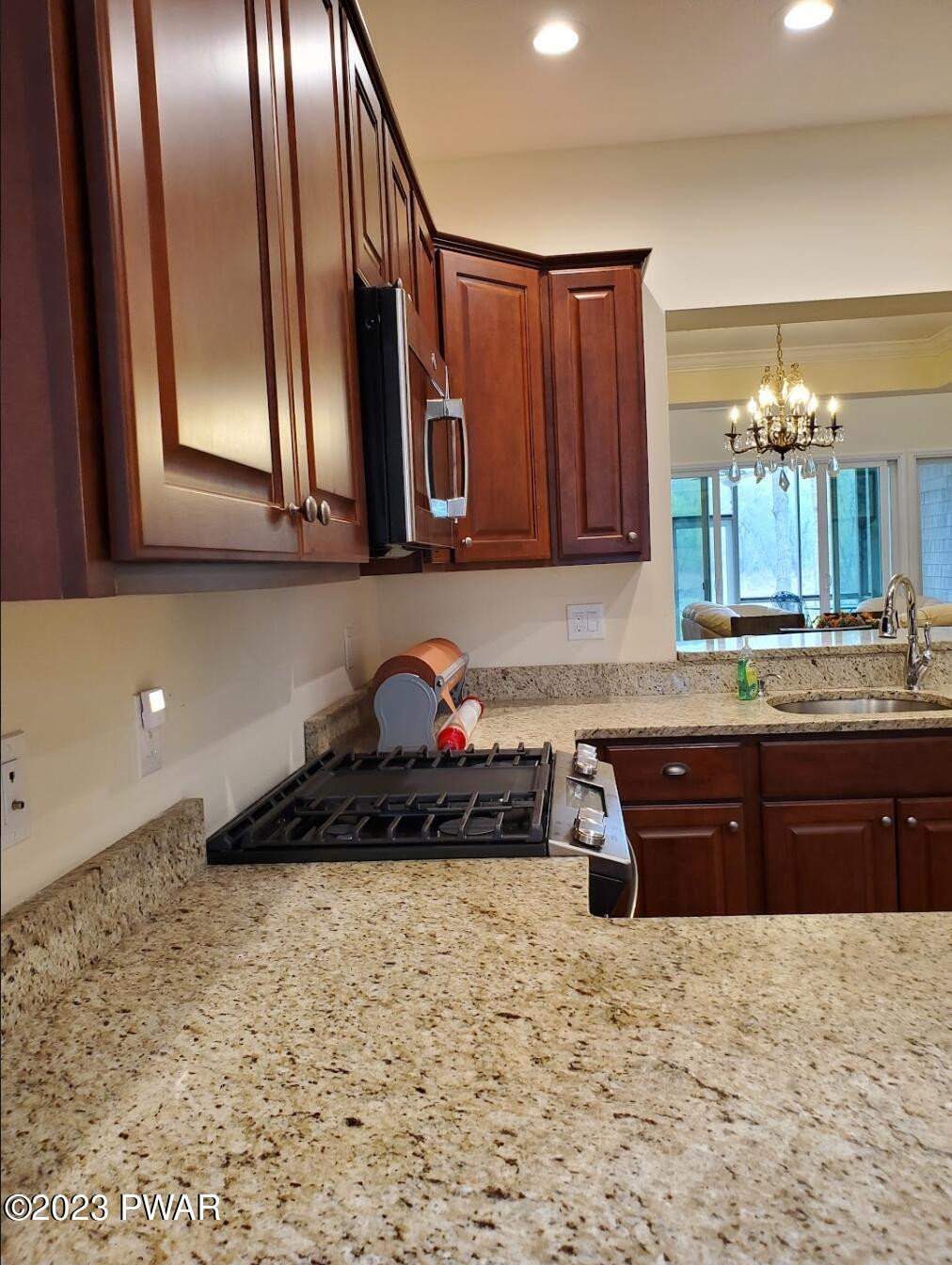 806 MacIntosh Way Matamoras, PA 18336 - Photo 9 of 53 a kitchen with a cabinets and stove