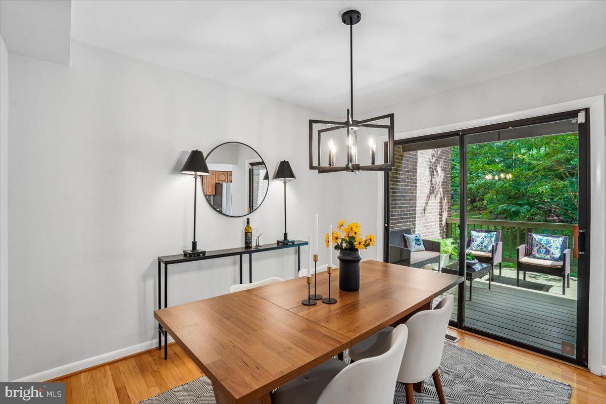 2021 Winged Foot Court Reston, VA 20191 - Photo 9 of 40 Dining room leads to large deck