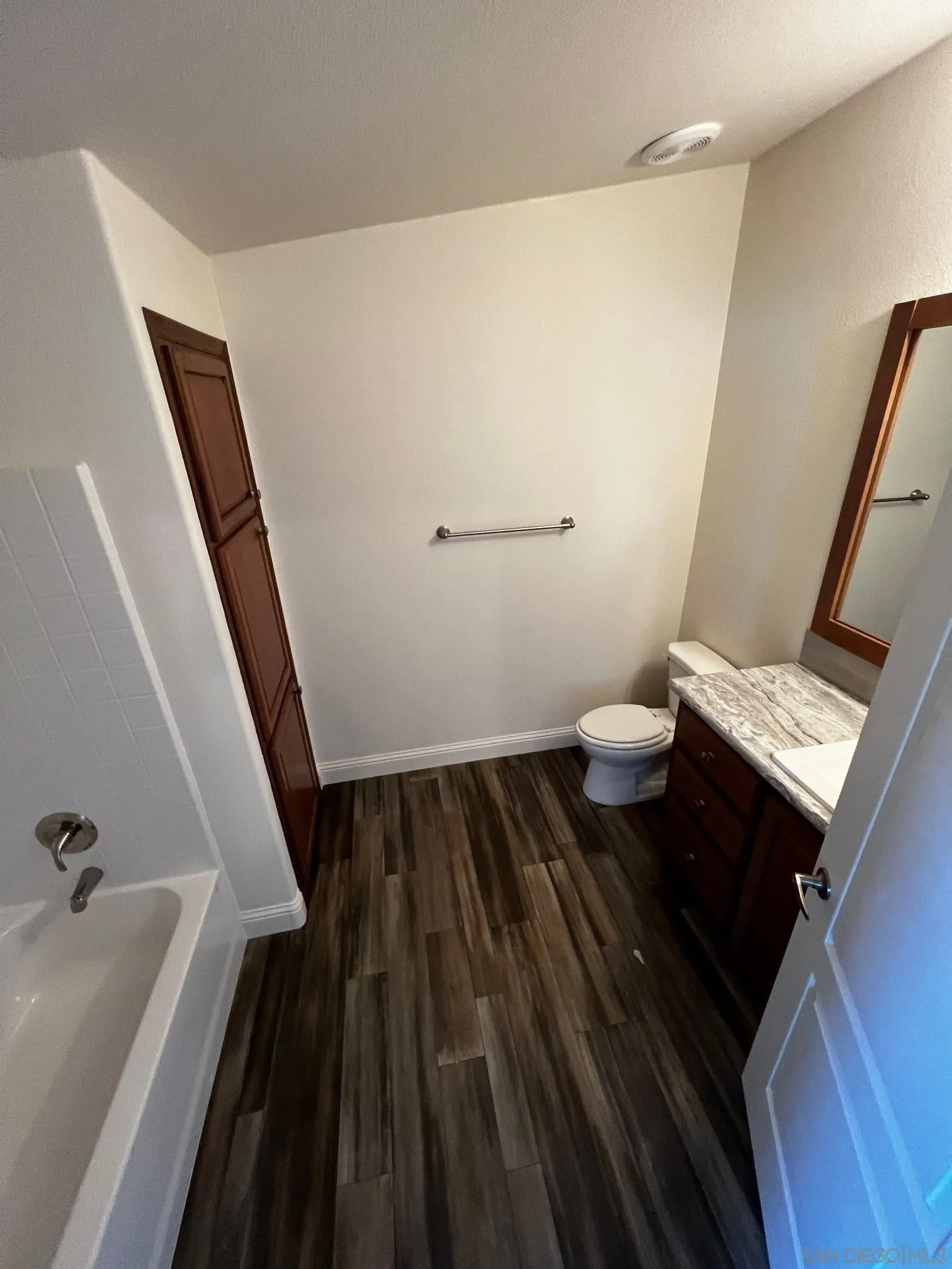 8975 Lamar Street Spring Valley, CA 91977 - Photo 12 of 59 a bathroom with a sink and a toilet