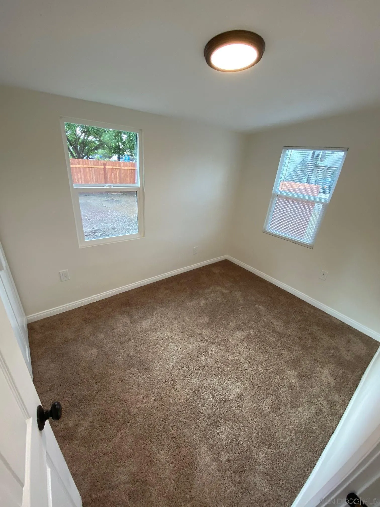 8975 Lamar Street Spring Valley, CA 91977 - Photo 19 of 59 an empty room with a window