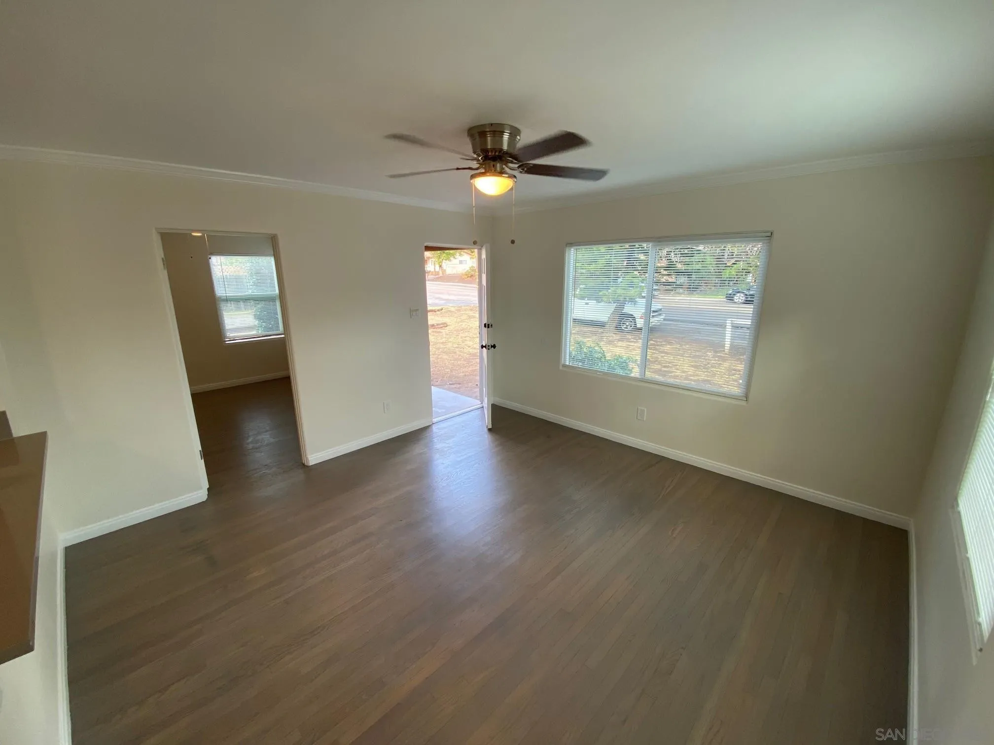 8975 Lamar Street Spring Valley, CA 91977 - Photo 26 of 59 wooden floor in an empty room with a window