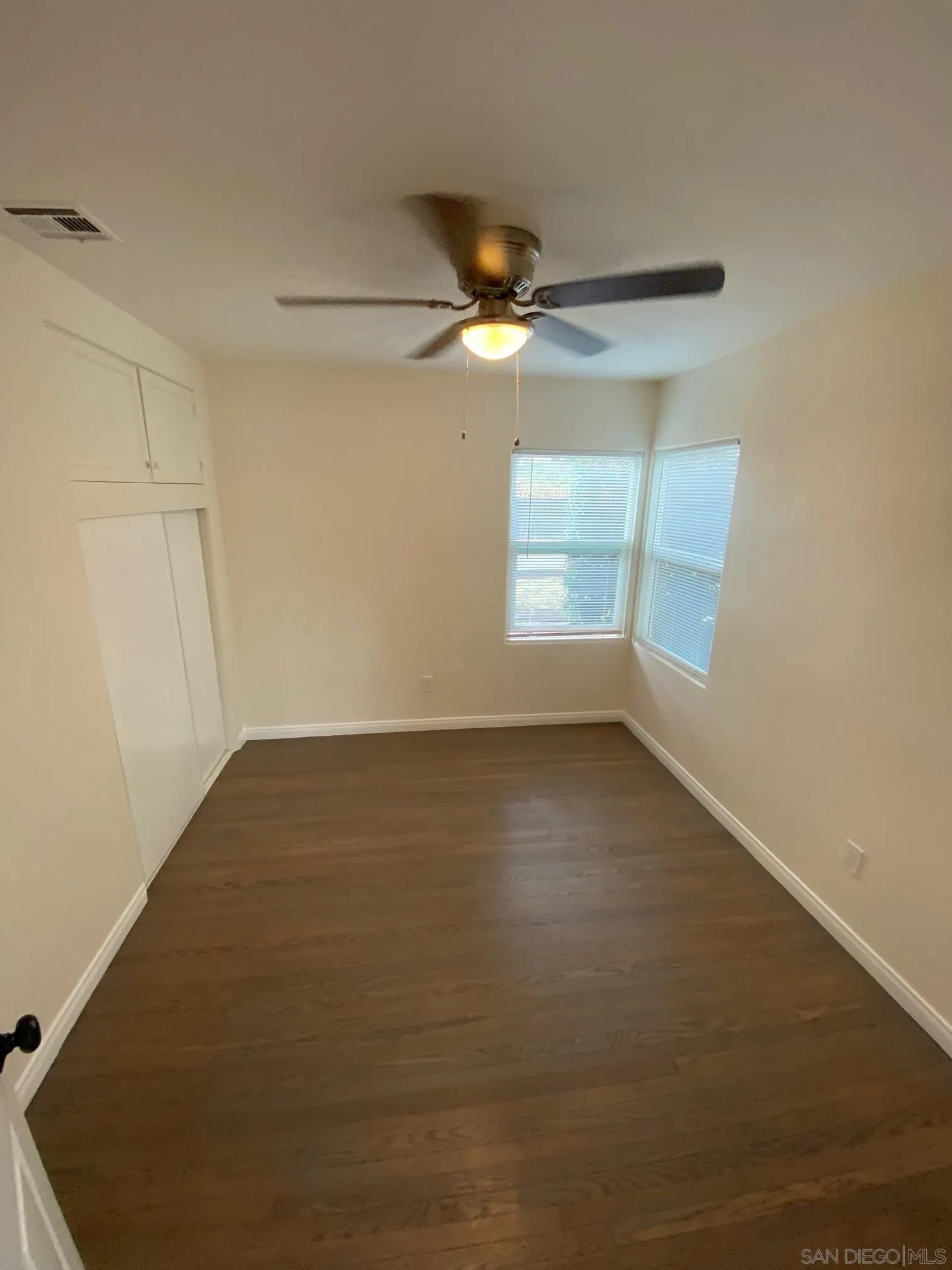 8975 Lamar Street Spring Valley, CA 91977 - Photo 31 of 59 a view of an empty room with a window