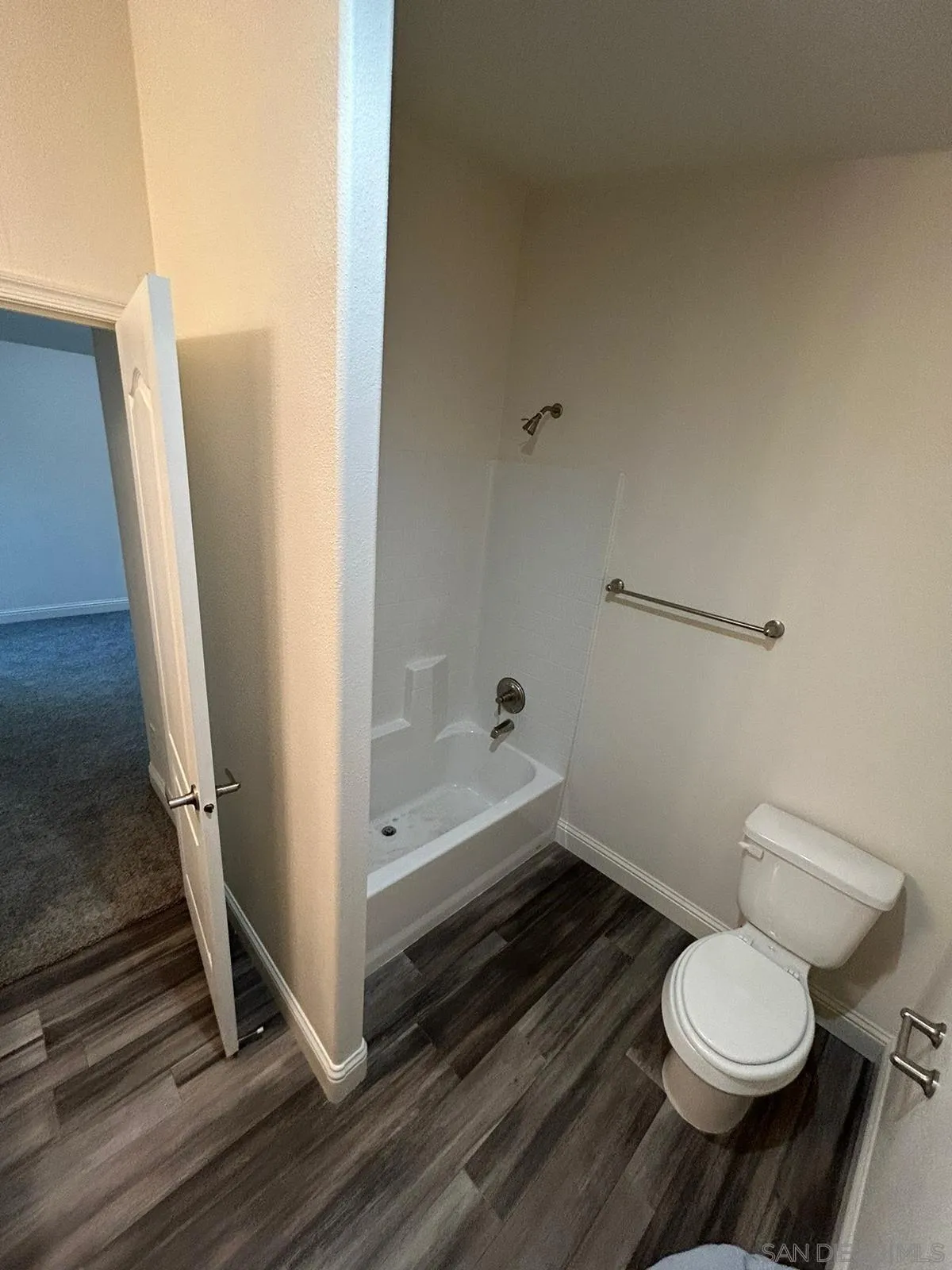8975 Lamar Street Spring Valley, CA 91977 - Photo 41 of 59 a bathroom with a toilet and a shower