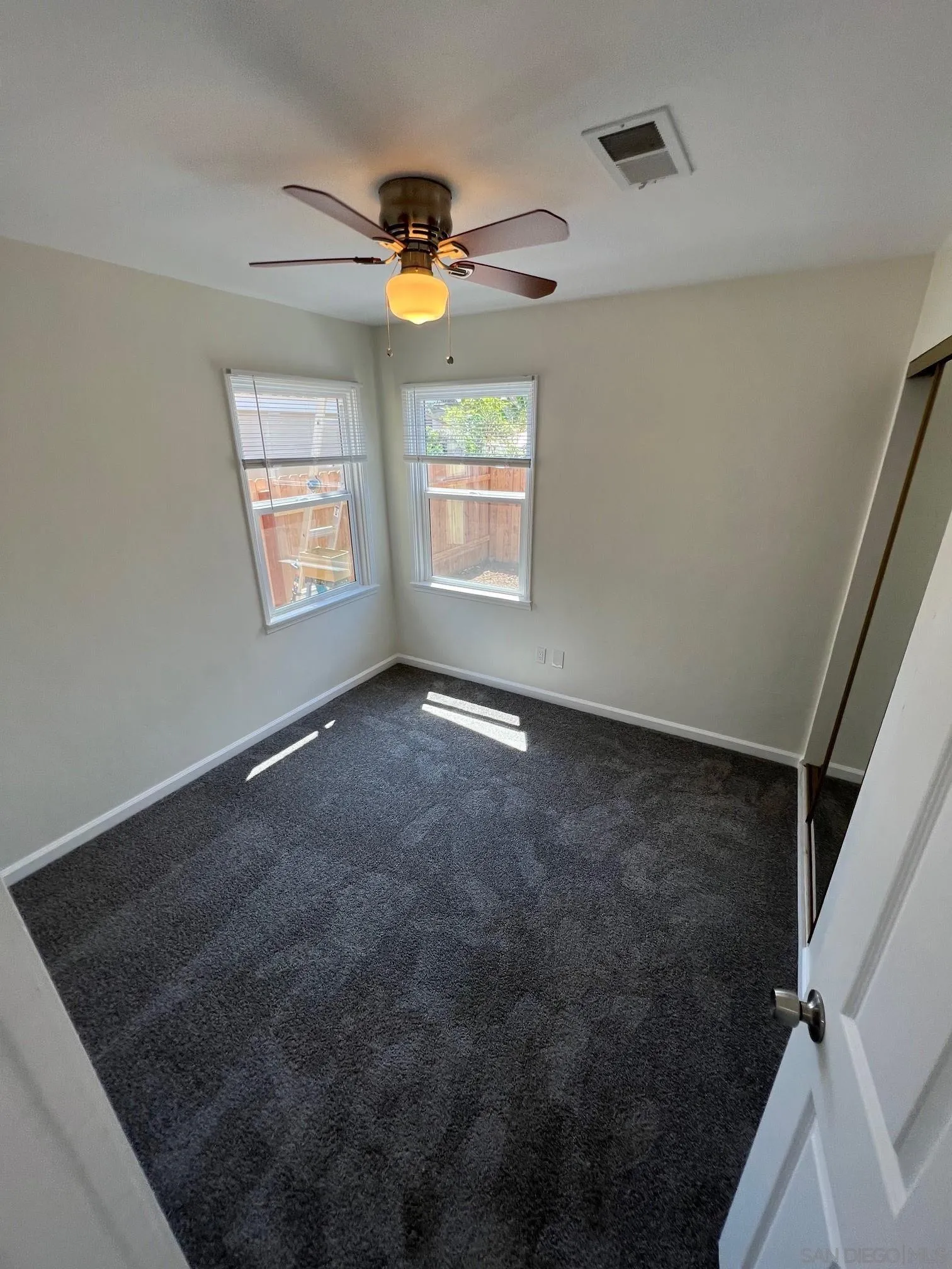 8975 Lamar Street Spring Valley, CA 91977 - Photo 52 of 59 a view of an empty room with a window