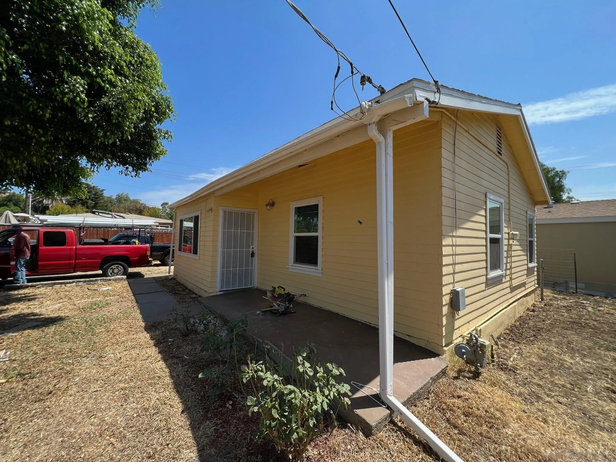 8975 Lamar Street Spring Valley, CA 91977 - Photo 59 of 59 a front view of a house with cars