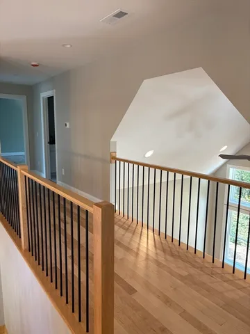 a bathroom with a shower and a sink