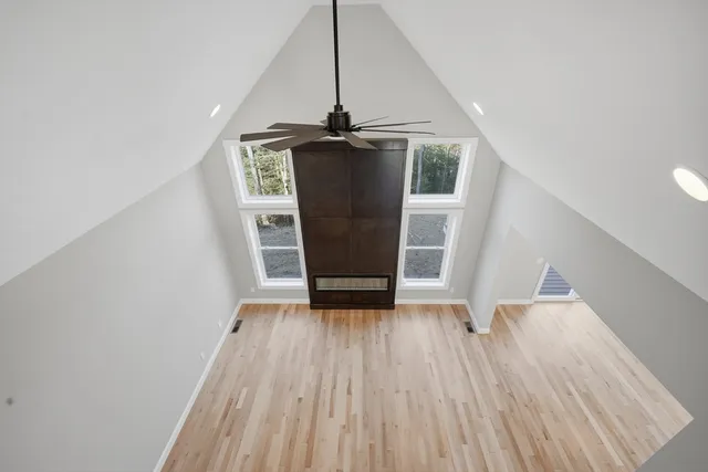 a view of an empty room with a window