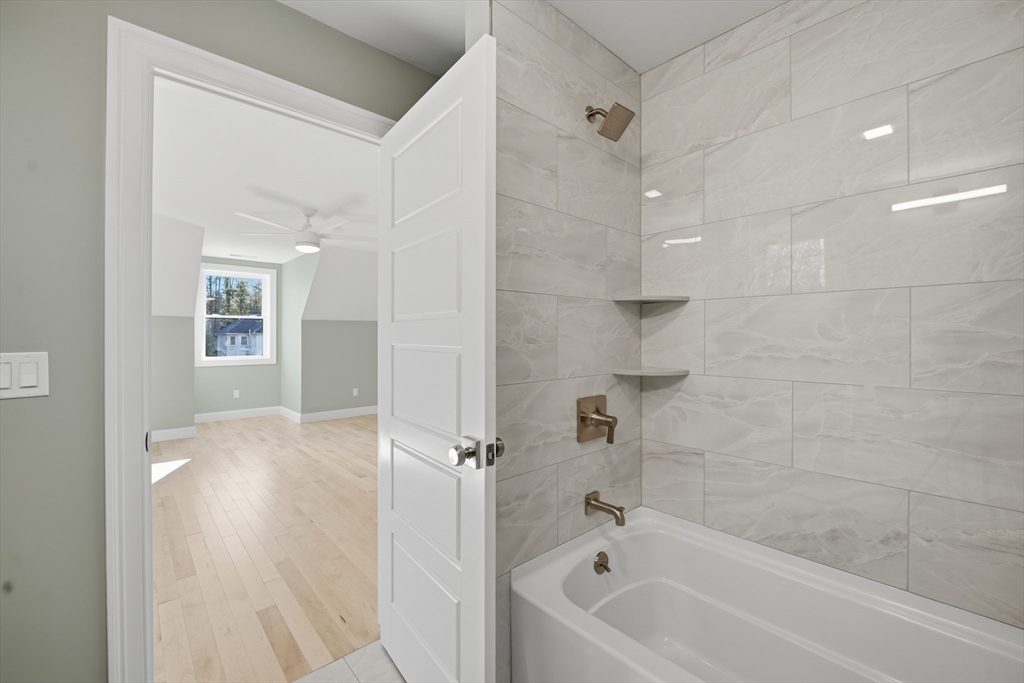 130 Linden Ridge Road Amherst, MA 01002 - Photo 31 of 40 a bathroom with a bathtub and a shower