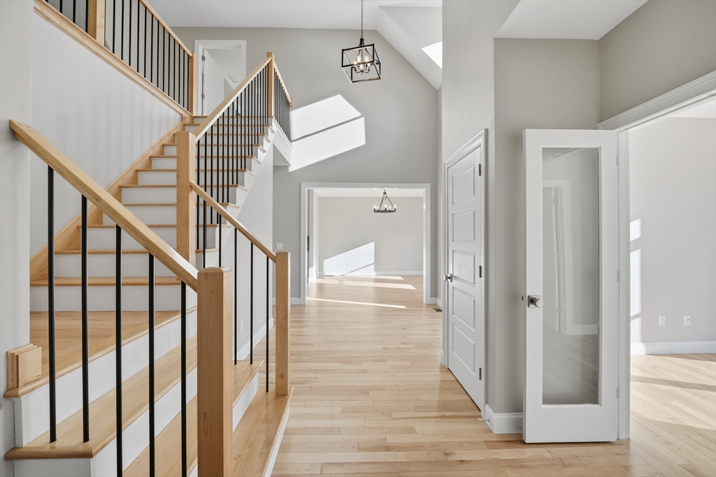 130 Linden Ridge Road Amherst, MA 01002 - Photo 4 of 40 a view of a hallway with wooden floor and entryway
