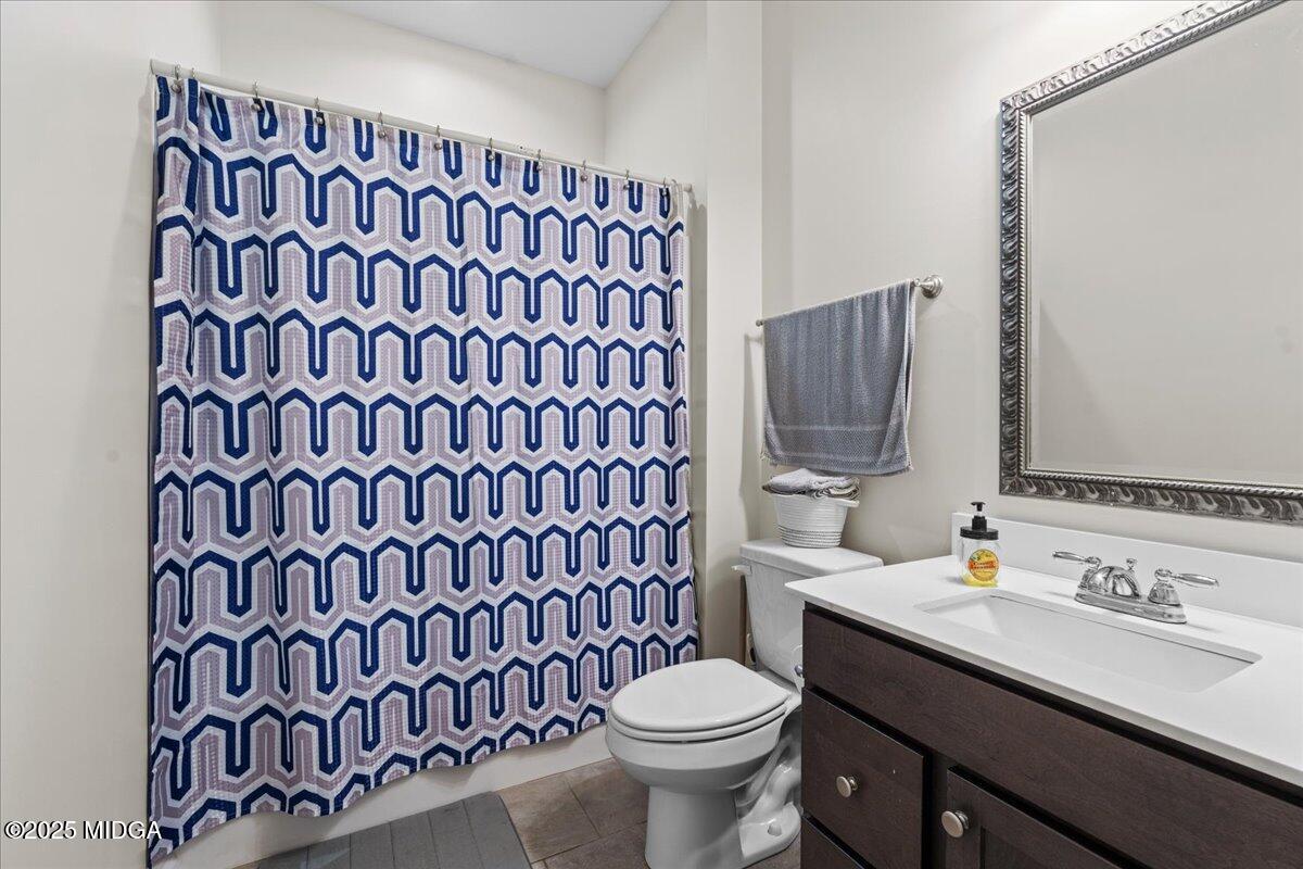 108 East E River Perry, GA 31069 - Photo 17 of 38 a bathroom with a sink and a mirror