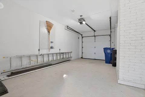a view of an empty room with windows