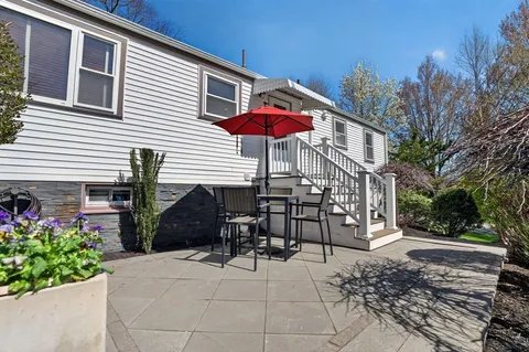 a front view of a house with patio
