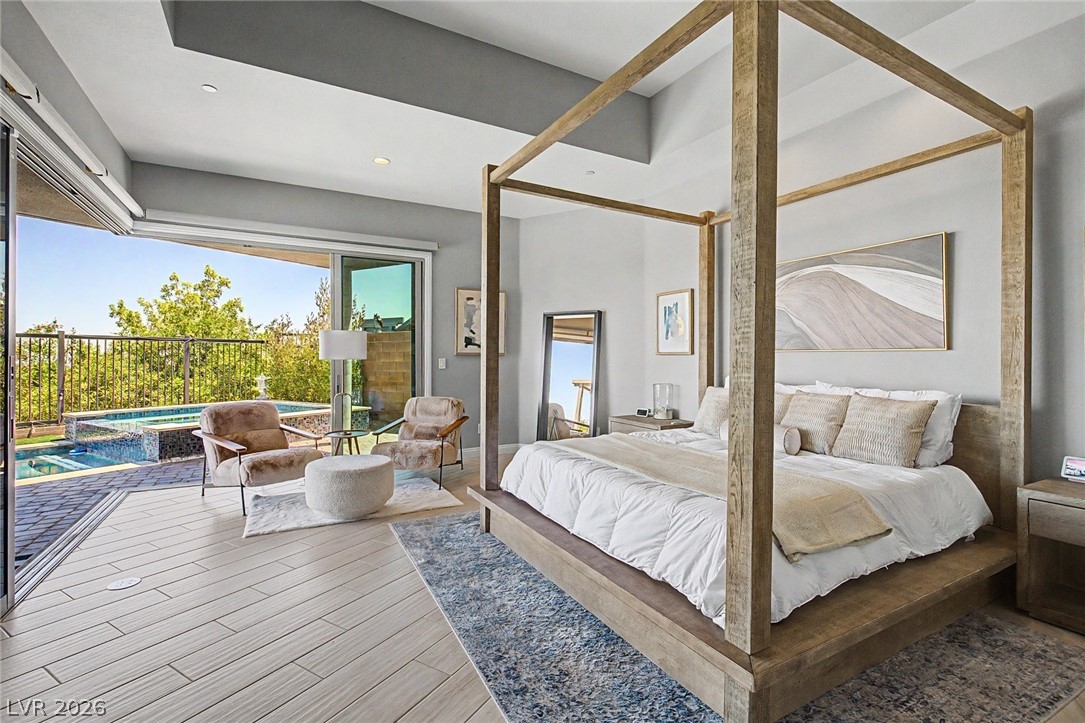 6014 Willow Ridge Court Las Vegas, NV 89135 - Photo 42 of 99 This primary bedroom offers an outdoor oasis with a private hot tub just steps away.